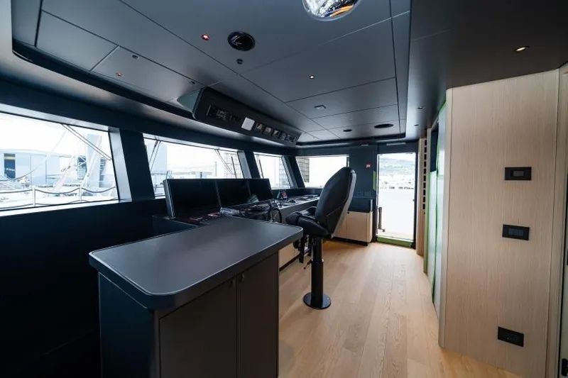 Presence Yacht Photos Pics Modern yacht interior with control panel, sleek design, and panoramic windows, Cantiere Delle Marche 130.37, 2026.