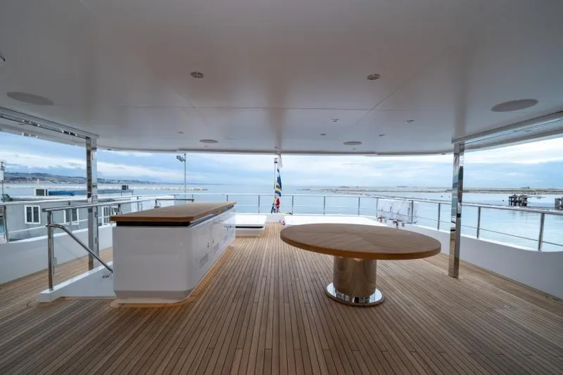 Presence Yacht Photos Pics Luxurious 2026 Cantiere Delle Marche 130.37 yacht deck with ocean view and elegant furnishings.