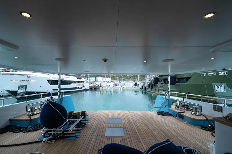 Presence Yacht Photos Pics Luxury yacht deck view, Cantiere Delle Marche 130.37, 2026 model, in marina setting.