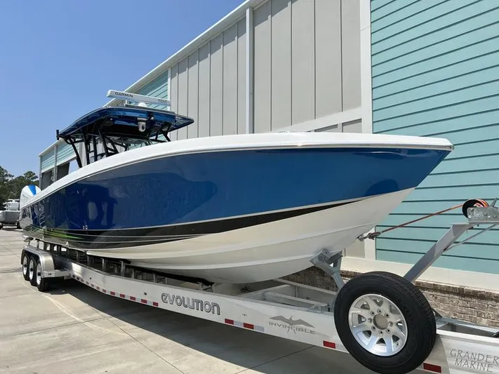  Yacht Photos Pics 2020 Nor-Tech 392 Super Fish boat on trailer outside a building.