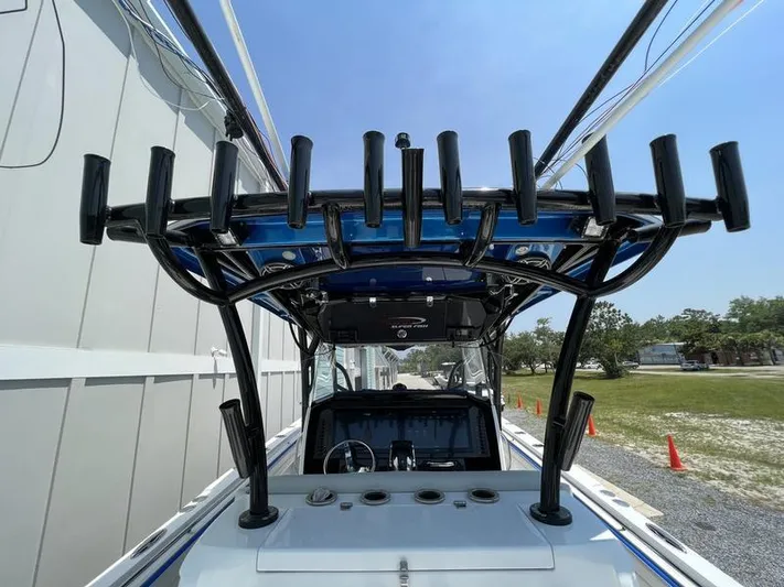  Yacht Photos Pics 2020 Nor-Tech 392 Super Fish boat with rod holders and center console.