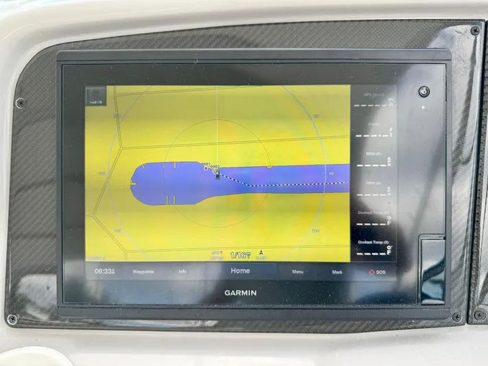 Tony Montana Yacht Photos Pics Garmin navigation display on 1999 Formula 400 Super Sport boat dashboard.