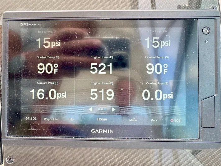 Tony Montana Yacht Photos Pics Garmin GPS display showing engine metrics for 1999 Formula 400 Super Sport.