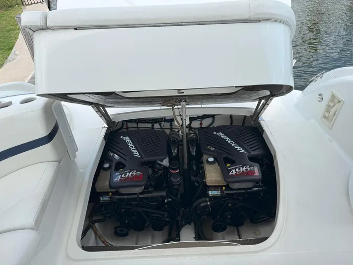 Tony Montana Yacht Photos Pics 1999 Formula 400 Super Sport boat with dual Mercury 496 engines visible.