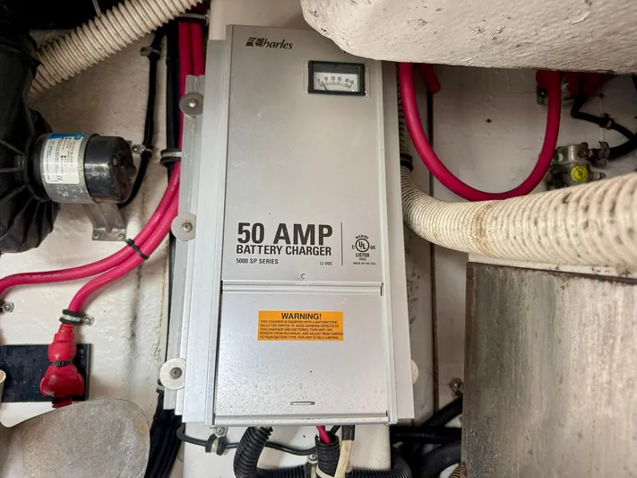 Tony Montana Yacht Photos Pics 50 AMP battery charger in a 1999 Formula 400 Super Sport boat engine room.