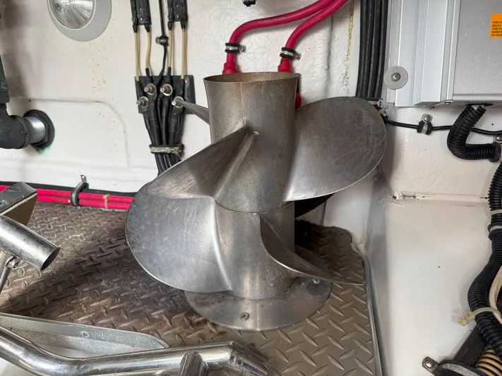 Tony Montana Yacht Photos Pics Stainless steel boat propeller in a 1999 Formula 400 Super Sport engine room.