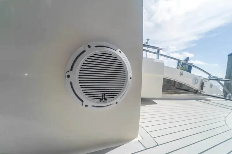 The Office Yacht Photos Pics Speaker on deck of 2009 Lazzara LSX 75 yacht under clear sky.