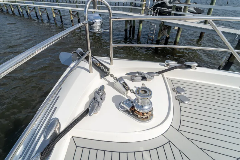 The Office Yacht Photos Pics Bow of 2009 Lazzara LSX 75 yacht with anchor and railing details.