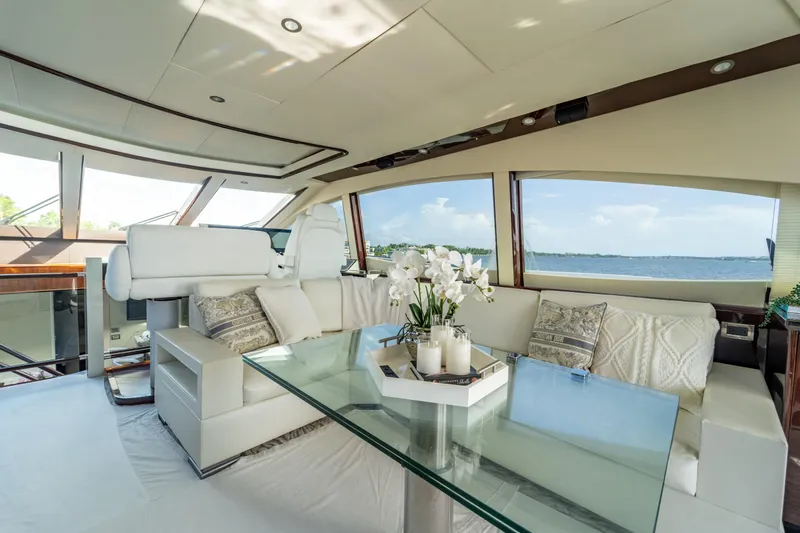 The Office Yacht Photos Pics Luxurious interior of 2009 Lazzara LSX 75 yacht with elegant seating and ocean view.