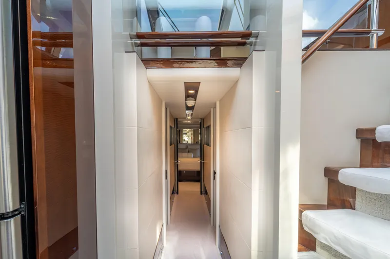 The Office Yacht Photos Pics Interior hallway of 2009 Lazzara LSX 75 yacht with modern design and wooden accents.