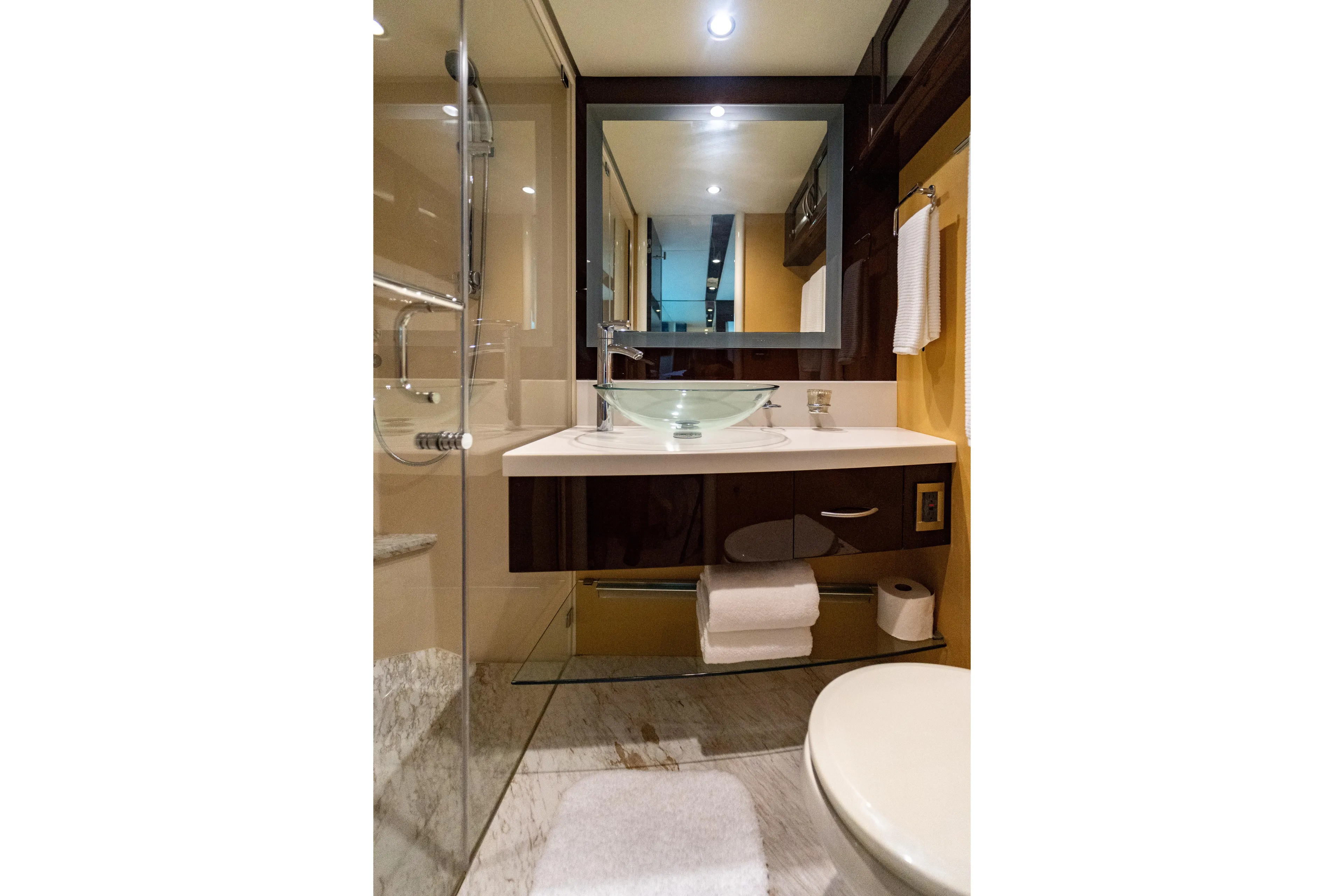 The Office Yacht Photos Pics Luxurious bathroom in 2009 Lazzara LSX 75 yacht with modern fixtures and elegant design.