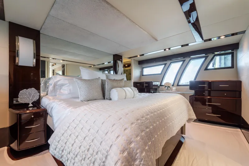 The Office Yacht Photos Pics Luxurious bedroom interior on 2009 Lazzara LSX 75 yacht with elegant bedding and modern design.