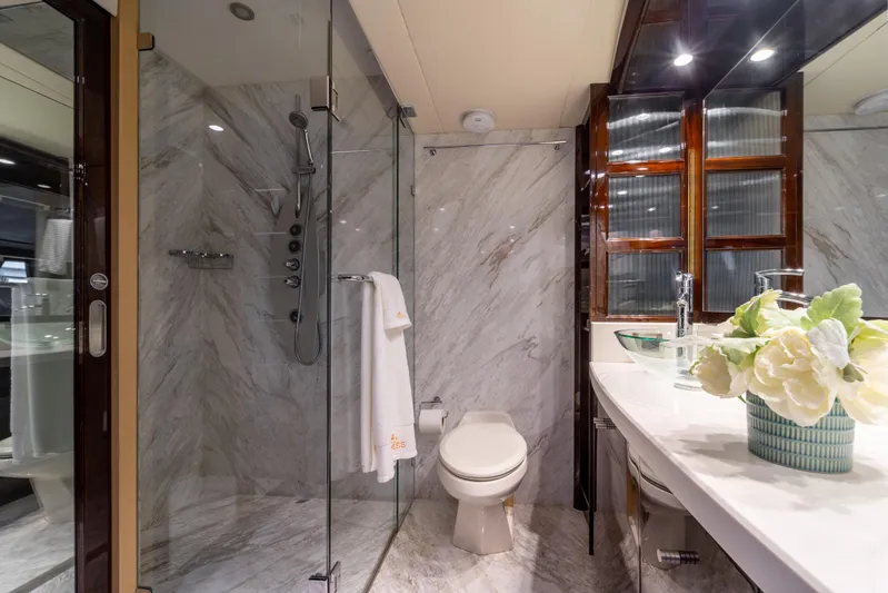 The Office Yacht Photos Pics Luxurious bathroom on 2009 Lazzara LSX 75 yacht with marble finishes and elegant decor.