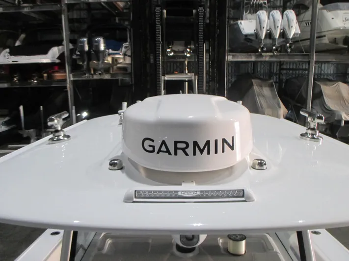  Yacht Photos Pics Garmin marine equipment on Freeman 38 boat, 2025 model, in a showroom setting.