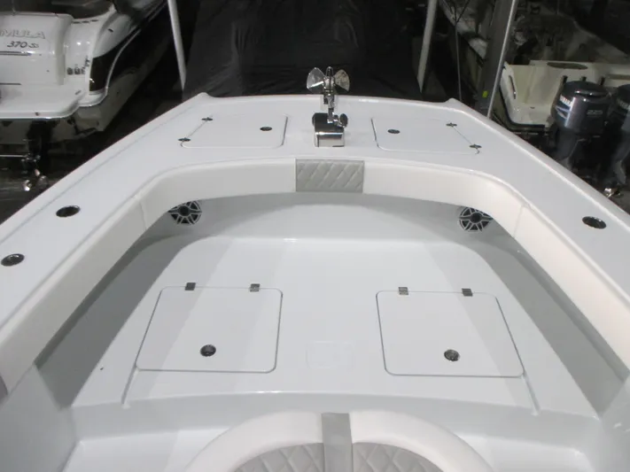  Yacht Photos Pics 2025 Freeman 38 boat interior with spacious seating and storage compartments.