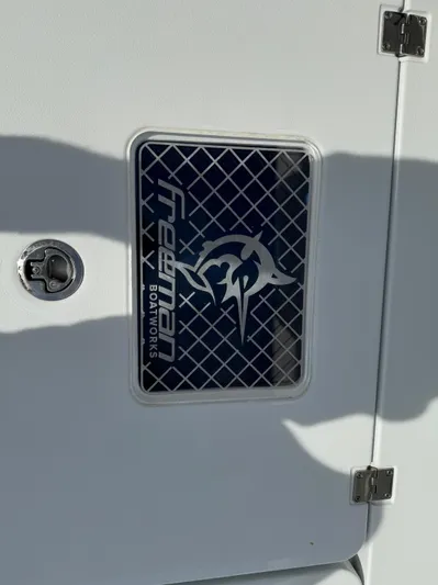  Yacht Photos Pics Freeman Boatworks logo on a Freeman 38 boat, model year 2025.