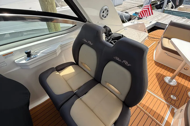  Yacht Photos Pics 2015 Sea Ray 350 Sundancer cockpit with dual seats and teak flooring.