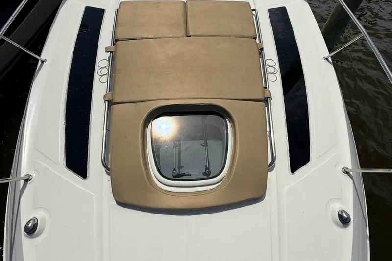  Yacht Photos Pics 2015 Sea Ray 350 Sundancer boat deck with sunroof and cushioned seating.