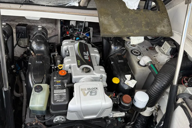  Yacht Photos Pics Engine compartment of a 2015 Sea Ray 350 Sundancer boat, featuring a powerful V8 engine.