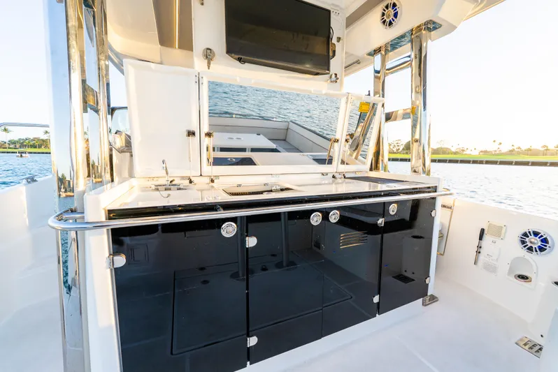  Yacht Photos Pics 2022 Jeanneau Leader 12.5 WA boat interior with sleek kitchen and modern amenities.