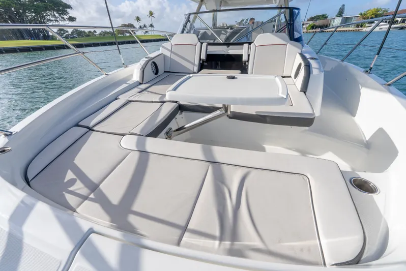  Yacht Photos Pics 2022 Jeanneau Leader 12.5 WA boat with spacious seating and sleek design on the water.