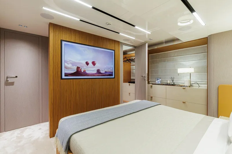  Yacht Photos Pics Luxurious bedroom interior of 2025 Cranchi Sessantadue 62 yacht with modern decor.