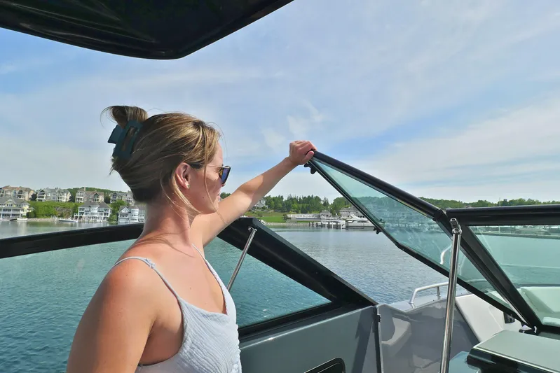  Yacht Photos Pics Woman enjoying view on 2026 Cruisers Yachts 34 GLS I/O boat.