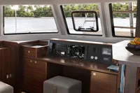 Modern interior of 2026 Nautitech 44 Open catamaran with navigation panel and scenic windows.