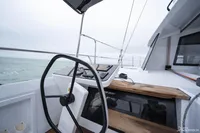 2025 Nautitech 44 Open yacht helm with modern navigation equipment and ocean view.