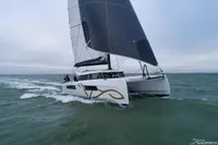 Sailing catamaran Nautitech 44 Open 2025 gliding on open sea with sleek design.