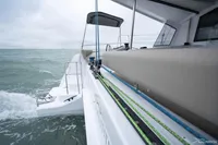 2026 Nautitech 44 Open catamaran sailing on open sea, showcasing sleek design and modern features.