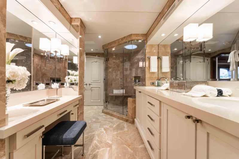 Summerdance Yacht Photos Pics Luxurious bathroom on 2004 Trinity Yachts motor yacht, featuring elegant marble and modern fixtures.