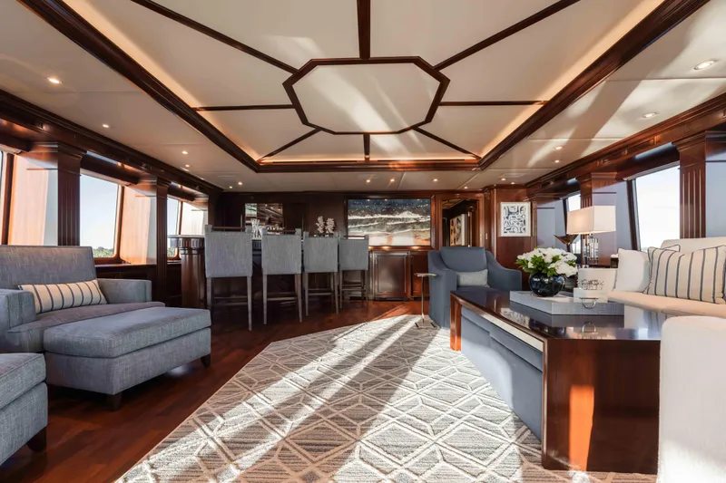 Summerdance Yacht Photos Pics Luxurious interior of 2004 Trinity Yachts motor yacht with elegant seating and wooden accents.