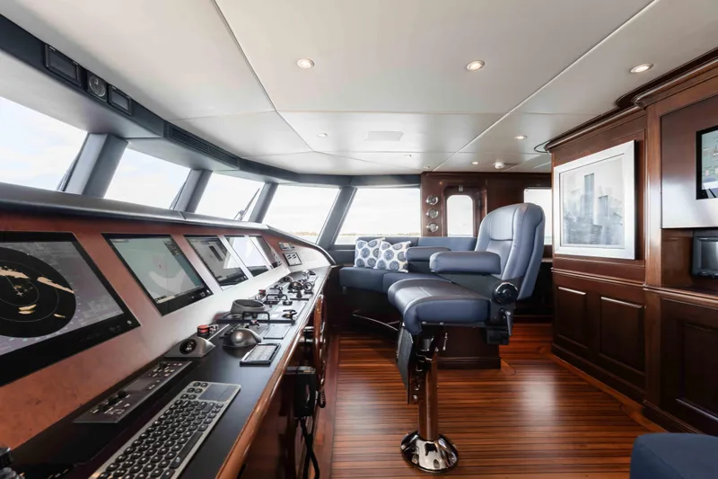 Summerdance Yacht Photos Pics Luxurious 2004 Trinity Yachts motor yacht helm with advanced navigation systems and plush seating.