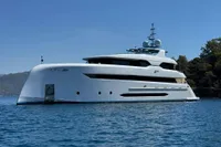 Luxurious 2014 Bilgin Custom 150 yacht anchored on serene blue waters.
