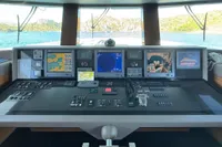 Control panel of a 2014 Bilgin Custom 150 yacht with navigation screens and controls.