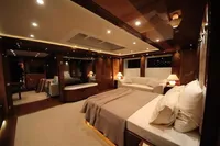 Luxurious bedroom interior of 2014 Bilgin Custom 150 yacht with elegant lighting and furnishings.