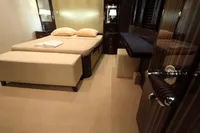 Luxurious bedroom interior of 2014 Bilgin Custom 150 yacht with elegant furnishings.