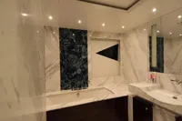 Luxurious marble bathroom with modern fixtures in Bilgin Custom 150 yacht, 2014 model.