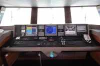 Control panel of a 2014 Bilgin Custom 150 yacht with navigation screens and communication equipment.