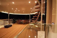 Luxurious Bilgin Custom 150 yacht deck with elegant lighting and spiral staircase, 2014 model.