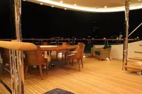 Luxurious Bilgin Custom 150 yacht deck with elegant wooden furniture, 2014 model.