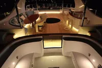 Luxurious Bilgin Custom 150 yacht interior, 2014 model, featuring elegant seating and ambient lighting.