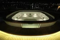 Luxurious illuminated jacuzzi on Bilgin Custom 150 yacht, 2014 model, at night.