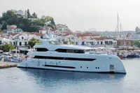 Luxurious 2014 Bilgin Custom 150 yacht docked in a scenic harbor.