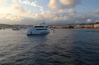 Luxurious Bilgin Custom 150 yacht on serene waters at sunset, 2014 model.