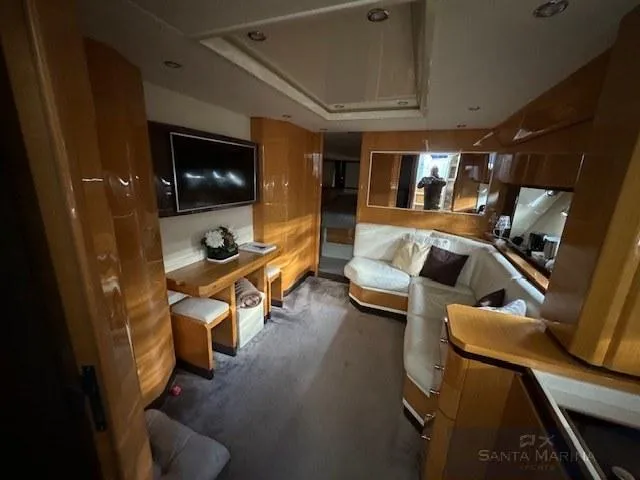  Yacht Photos Pics Luxurious interior of a 2006 Cantieri di Sarnico 60 yacht with modern furnishings.