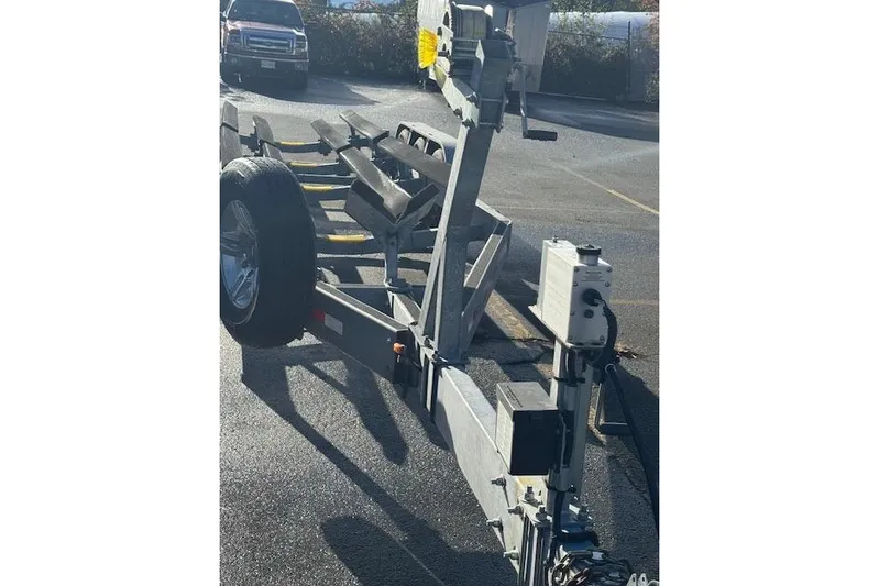  Yacht Photos Pics Boat trailer for 2020 Boston Whaler 325 Conquest in parking lot.