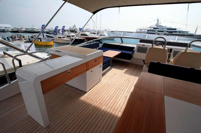 Gala Yacht Photos Pics Luxurious 2012 Fsirline Squadron 78 yacht interior with elegant wood finish and spacious seating.