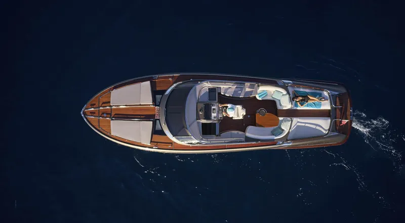  Yacht Photos Pics Overhead view of 2014 Riva Rivarama Super 44 luxury yacht on open water.